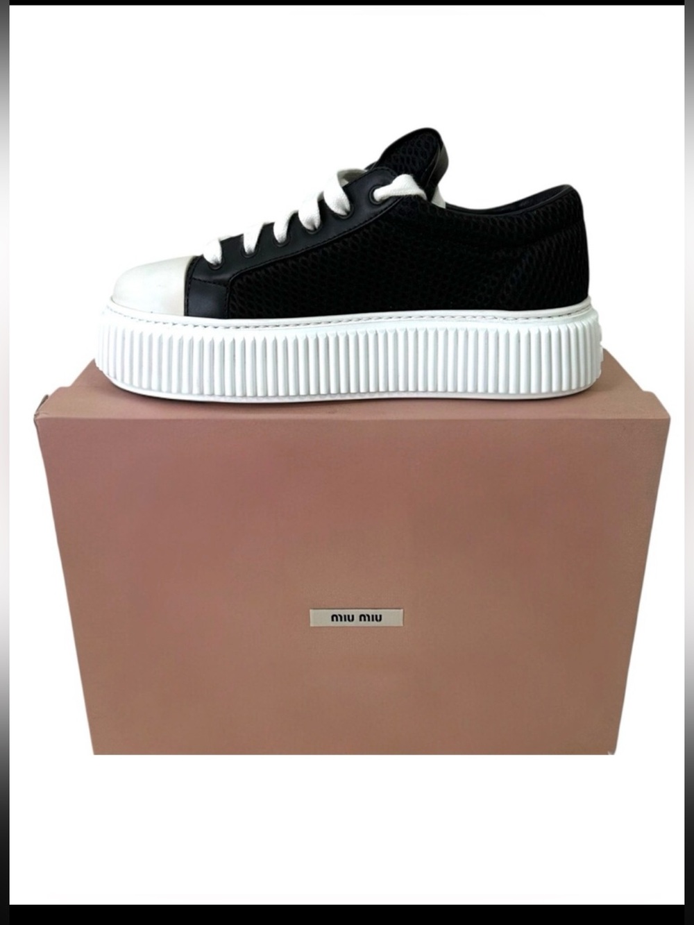 Miu Miu Black and White Platform Sneakers
